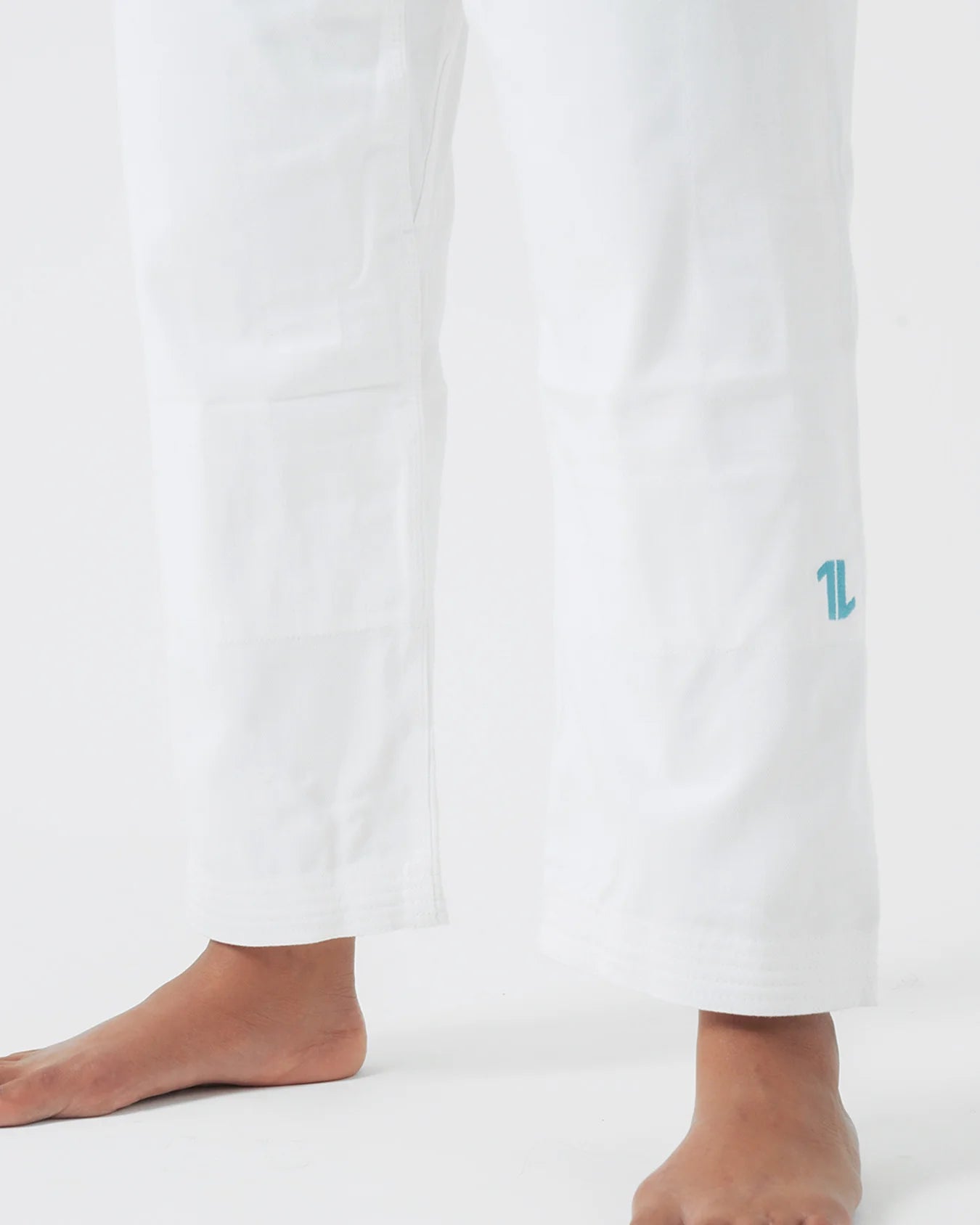The ONE Womens Jiu Jitsu Gi - White/Sky Blue - FREE White The ONE Womens Jiu Jitsu Gi - White/Sky Blue - FREE White